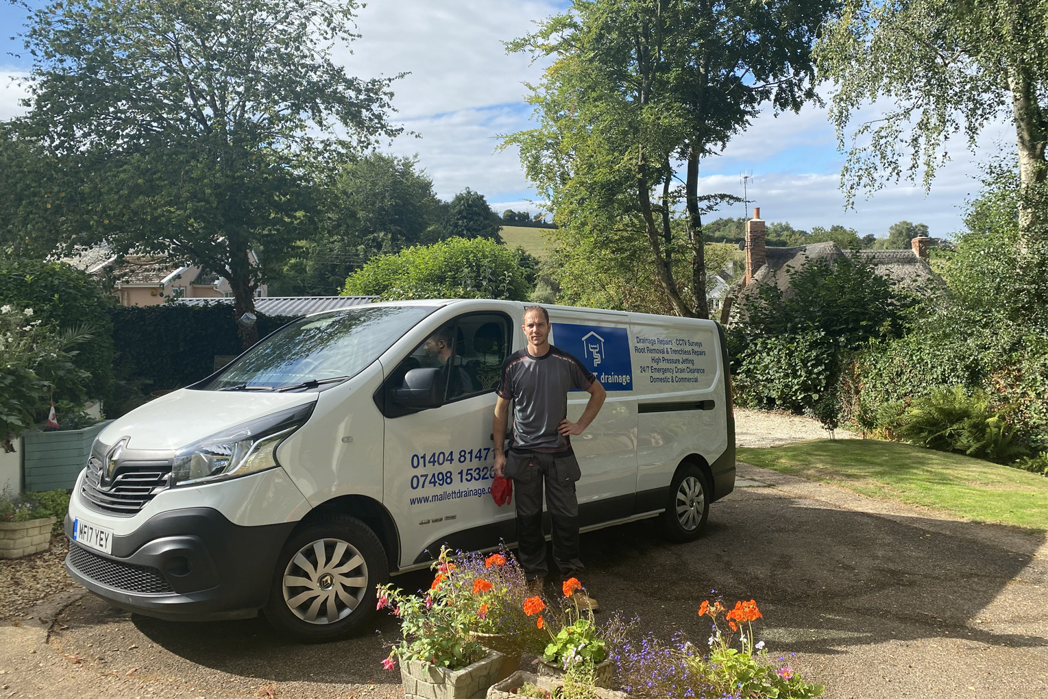 Chris of Mallett Drainage with van